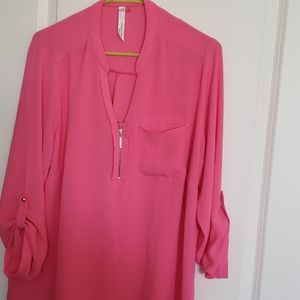 A blush pink blouse